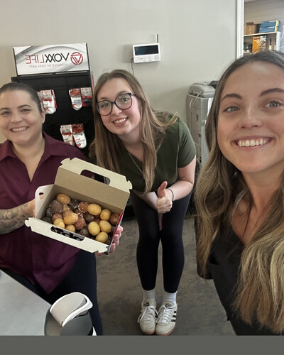 admin team sharing donuts